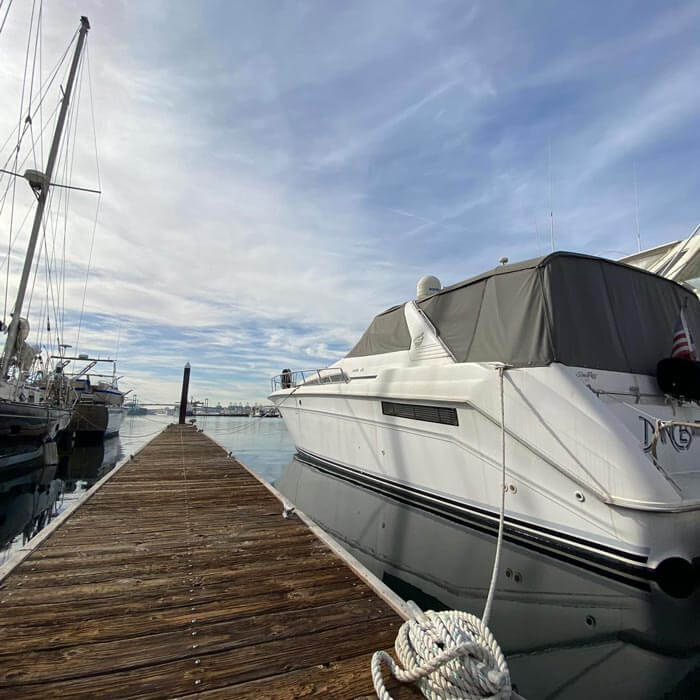 Boat tied to dock in the Marina, Southern California