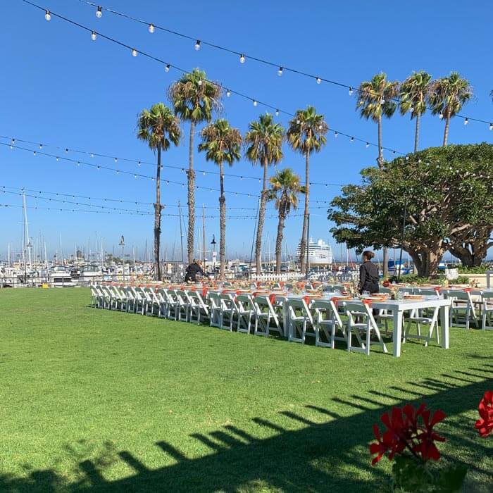 The chair and tables set up at marina event space at San Pardo, CA